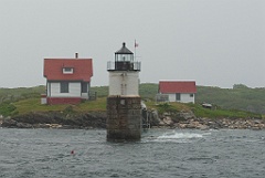 Ram Island Lighthouse in Rough Surf From Storm in Maine